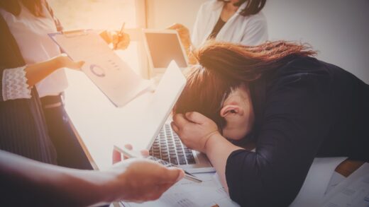 overworked business woman with colleagues at workp 2026 03 26 22 47 16 utc